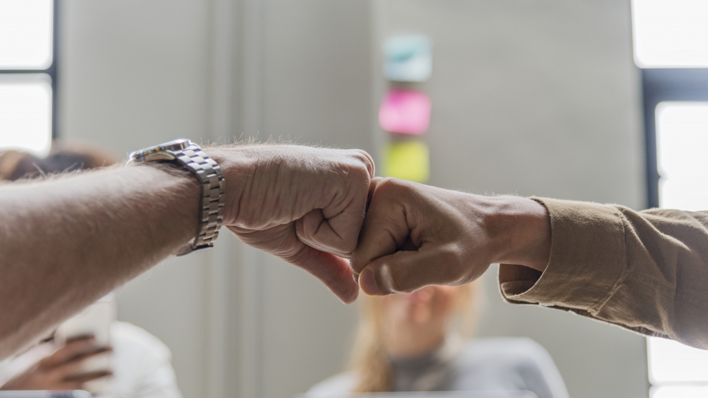 two-people-giving-fist-bump.jpg